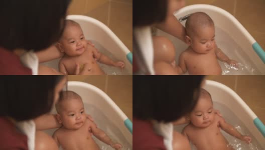 新生儿在浴缸中高清在线视频素材下载