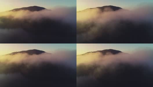鸟瞰图的晨雾在伊尔山湖，日出拍摄，视频高清在线视频素材下载