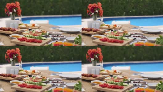 土耳其早餐餐桌和游泳池的背景高清在线视频素材下载