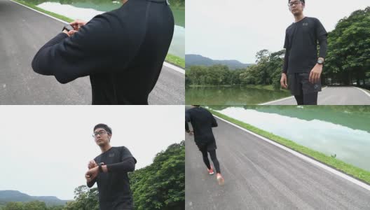 男人使用心率监测器手表跑步的2个镜头高清在线视频素材下载