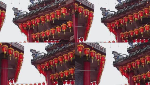 高清视频中国红灯笼。点灯庆祝春节。中国台湾美丽的寺庙夜景高清在线视频素材下载