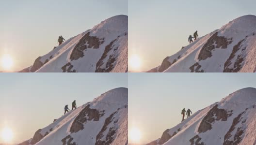 男性登山运动员在白雪覆盖的山脊上行走高清在线视频素材下载