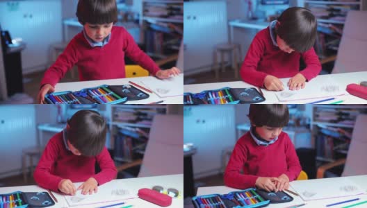 孩子从铅笔盒里拿出橡皮擦，开始在纸上擦画高清在线视频素材下载
