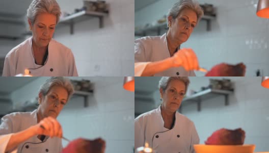 厨房厨师用镊子完成一道菜高清在线视频素材下载