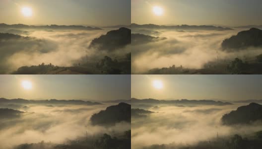 鸟瞰图的雾滚过流动在泰国北部的雨林山，Hyper lapse高清在线视频素材下载