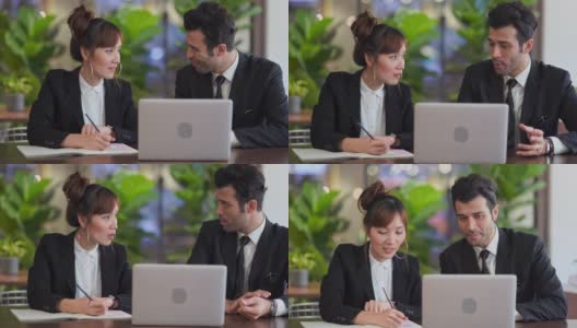 亚洲商务人士使用笔记本电脑一起工作高清在线视频素材下载
