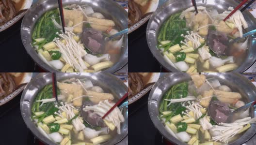 在锅里煮肉和蔬菜高清在线视频素材下载