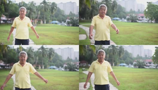 一位华裔老人在他们附近的公园里健身高清在线视频素材下载