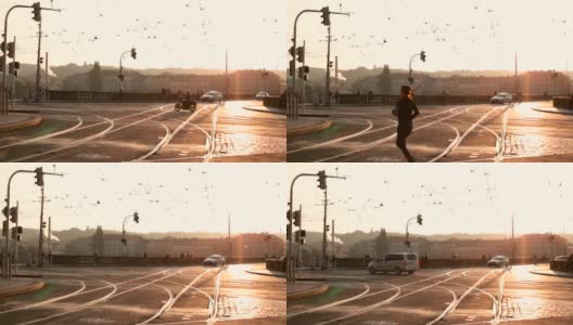 城市的十字路口。一辆摩托车在动，一个女人在跑。高清在线视频素材下载