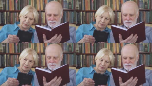 老年夫妇在家里阅读电子书和纸质书。纸张与数字阅读的概念高清在线视频素材下载
