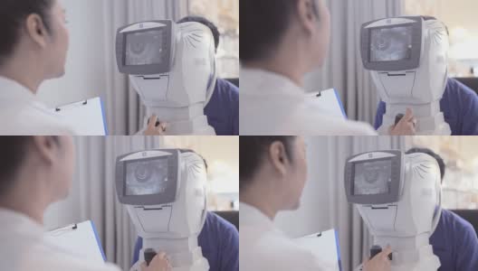 成熟女性眼科医生在机器上测试高清在线视频素材下载