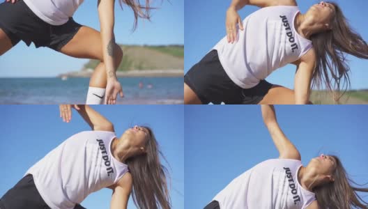 Zumaia, Gipuzkoa / Spain;2019年9月，一名女子在锻炼橡皮筋高清在线视频素材下载