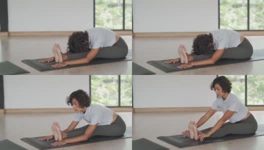 4K亚洲女子瑜伽练习室与男教练进行瑜伽练习高清在线视频素材下载