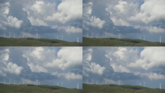 草原上风力涡轮机农场的鸟瞰图高清在线视频素材下载