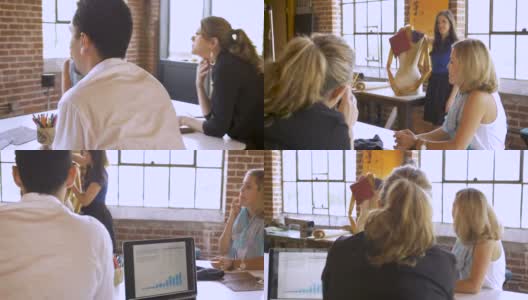年轻有创意的女商人给她的同事做演示高清在线视频素材下载