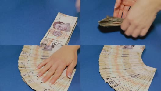 墨西哥500比索钞票在表面扇动高清在线视频素材下载