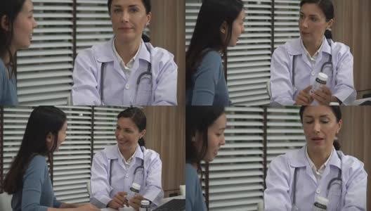 开朗的中年亚洲女医生与年轻的白人女性交谈高清在线视频素材下载