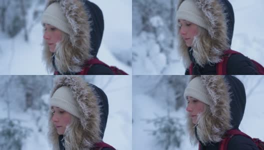 女孩在冬天爬山的慢镜头细节高清在线视频素材下载