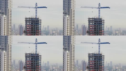 建筑工地与起重机新楼摩天楼工人队高清在线视频素材下载