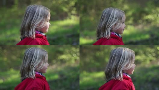 年轻女孩穿过树林慢镜头高清在线视频素材下载