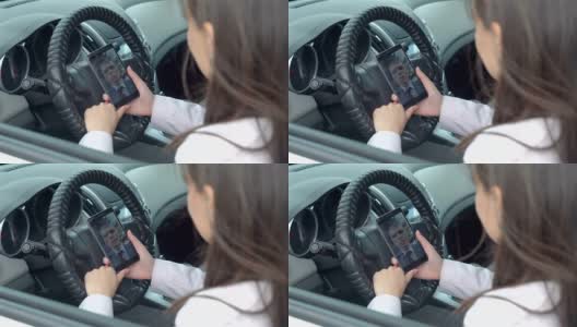 女商人在车上打视频电话高清在线视频素材下载