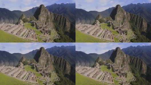 在一个阳光明媚的日子里，秘鲁的马丘比丘遗址和梯田俯瞰高清在线视频素材下载