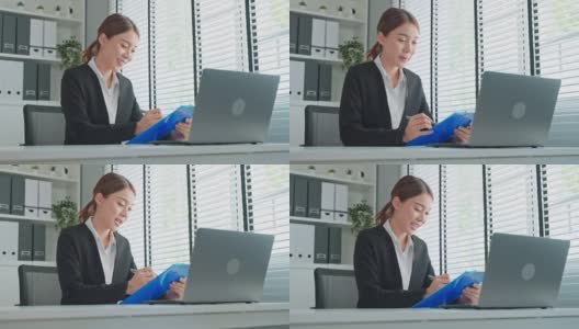 亚洲商界女性人力资源经理在线视频面试。迷人的女上班族在工作场所用笔记本电脑和工作人员通过虚拟会议进行交流。高清在线视频素材下载