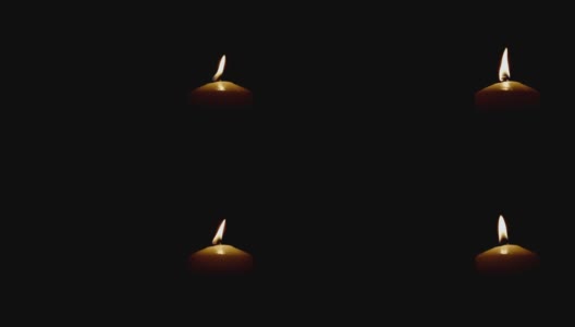 燃烧的蜡烛孤立在黑色背景火焰在风中移动图片的右侧高清在线视频素材下载