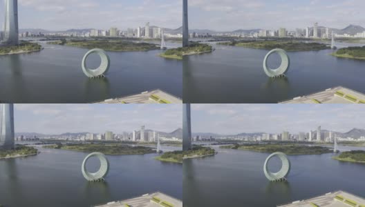 内海中一个三维圆形建筑的航拍视频高清在线视频素材下载