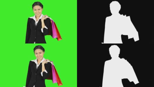 一个女人展示绿色背景的空白名片高清在线视频素材下载