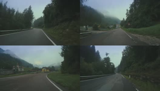在一个雾蒙蒙的山口上装有摄像头的汽车高清在线视频素材下载