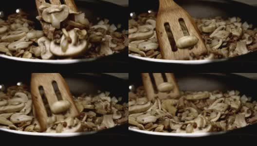 平底锅炒蘑菇高清在线视频素材下载