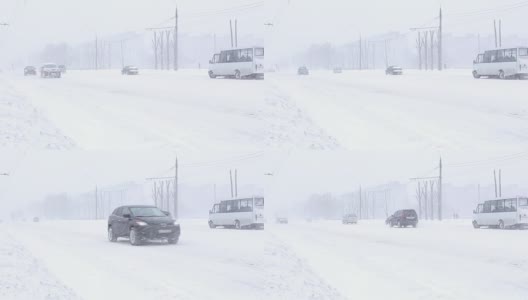 汽车在暴风雪中沿着街道行驶高清在线视频素材下载