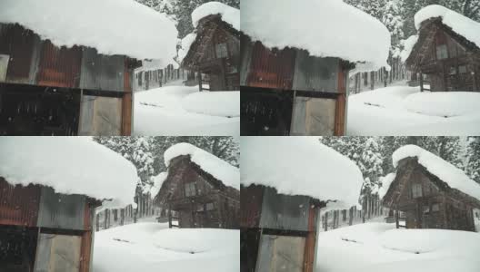 摄影车拍摄:白川村一间日本小木屋下的雪高清在线视频素材下载