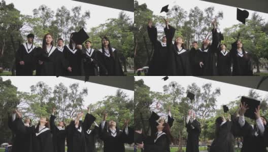 毕业典礼上，学生们向空中抛帽子高清在线视频素材下载