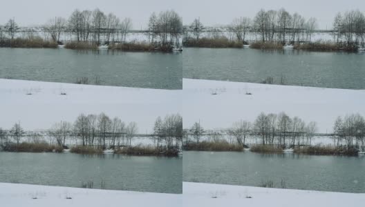 雪花飘落在美丽的灰色冬日风景上高清在线视频素材下载