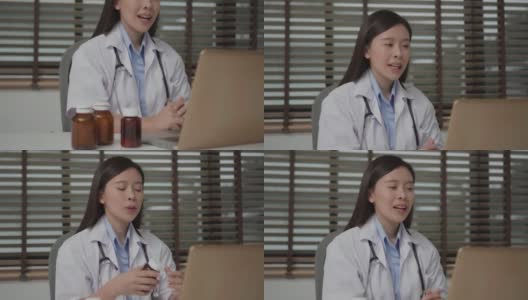 一个亚洲医生在给病人视频通话高清在线视频素材下载