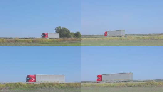 一辆卡车在城外的路上行驶，一辆现代货运卡车在高速公路上行驶高清在线视频素材下载