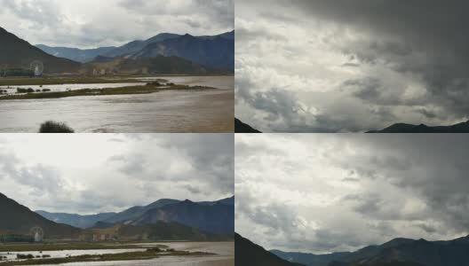 四千条拉萨河随着远处的城楼，乌云团翻滚在西藏上空高清在线视频素材下载