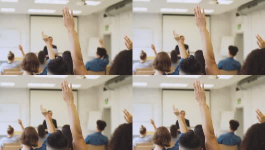 学生在课堂上回答问题时举手高清在线视频素材下载