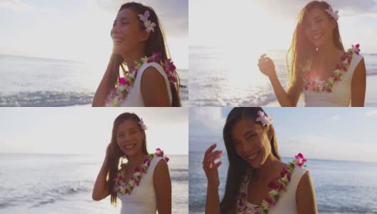 多种族沙滩女人微笑可爱笑在美丽的海滩上夏威夷。可爱的女孩在夏威夷海滩上戴着传统的花环。多元文化的亚洲高加索女孩日落在瓦胡岛，夏威夷美国高清在线视频素材下载