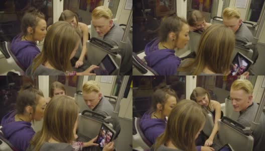 火车上的四名青少年使用科技高清在线视频素材下载