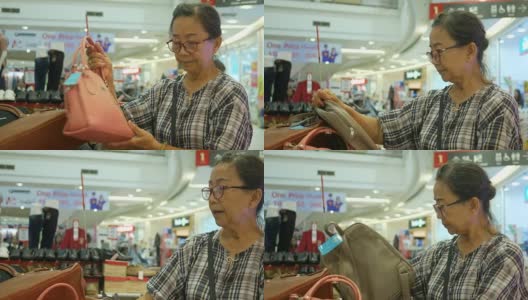 亚洲老年女性在购物中心购物高清在线视频素材下载
