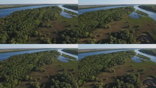 从空中拍摄的Dnipro与它美丽的流入量，绿色的小岛，在夏天高清在线视频素材下载