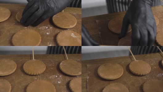 烤姜饼。糕点师把做好的饼干摆好，用羊皮纸高清在线视频素材下载