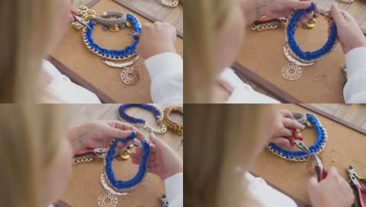 在肩膀上的女人制作手工珠宝的特写镜头高清在线视频素材下载