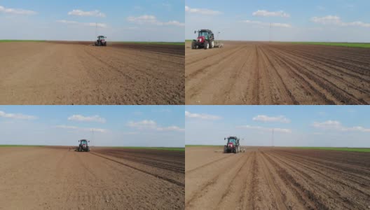 无人机拍摄的农民用拖拉机播种作物高清在线视频素材下载