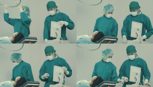一群亚洲医生和护士在手术室里交谈。高清在线视频素材下载