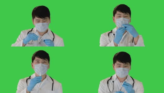年轻的亚洲医生正在从安瓿溶液与一个注射器上的绿色屏幕，Chroma关键高清在线视频素材下载
