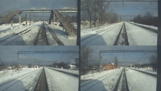 4K的视角从火车火车头。火车一路驶过火车站高清在线视频素材下载